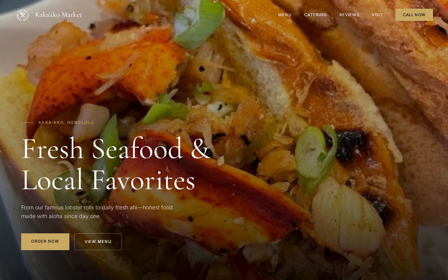Homepage of the Kaka'ako Market and Catering website, showing a lobster roll hero image and the headline Fresh Seafood and Local Favorites